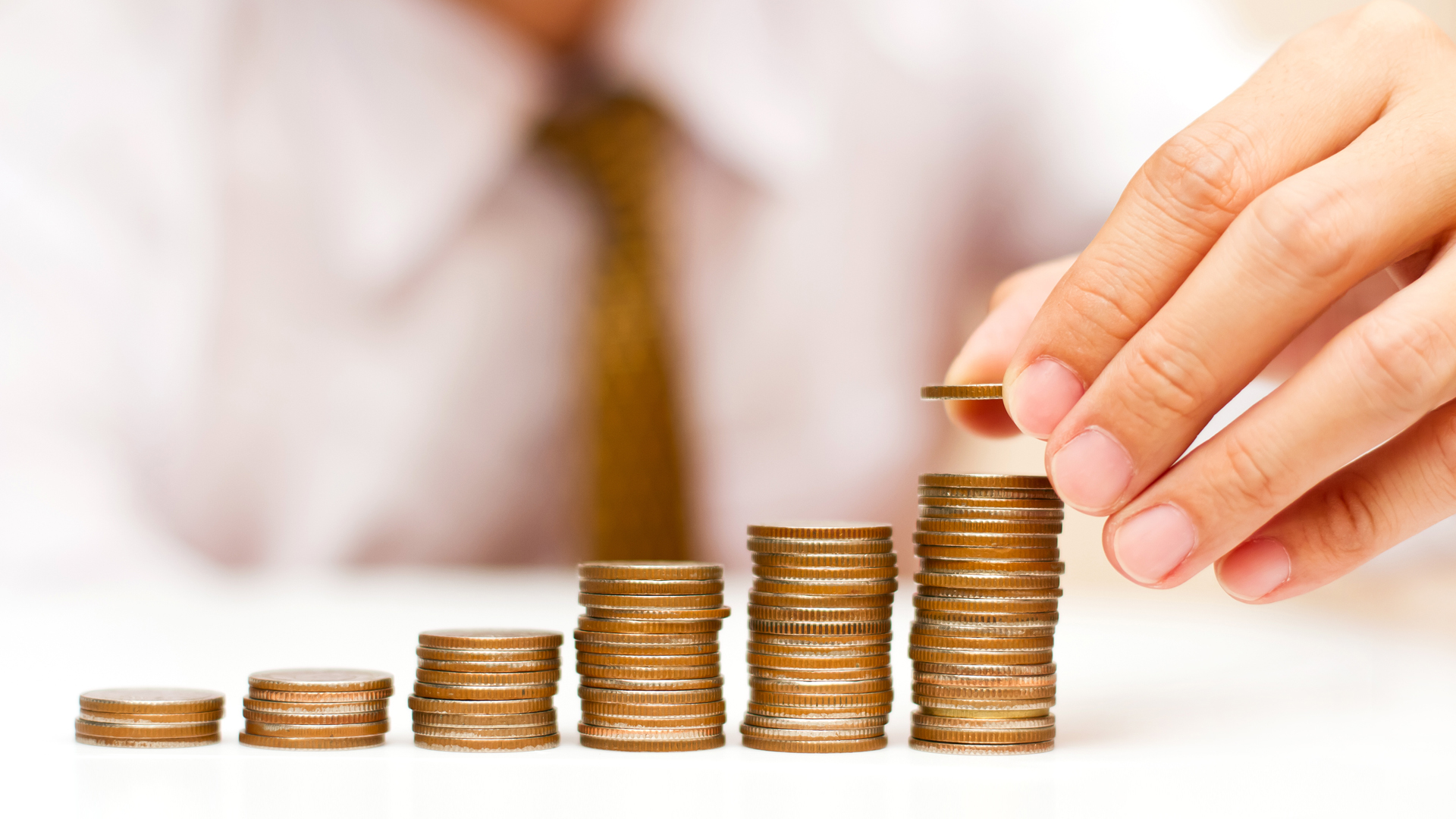 business man with rising coins